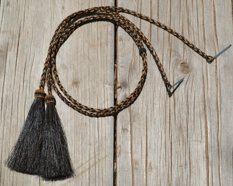 Close Up View natural horse hair stampede string with cotter pin attachments. Black/Chestnut/Black