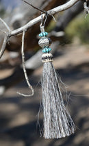 Close Up View 4 1/2" total length horsehair zipper pull with spring clip. Handmade horsehair various colors and beading pattern. Grey-Turquoise/RB/Turquoise