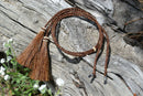 Close Up View Western Style 1/4" wide and 24" long, braided horse hair eye glass holder (gator/leash) with tassels.    Chestnut 