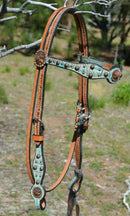 Circle Y of Yoakum -  Custom 5/8" Scalloped Browband Gag Headstall  with floral tooling with antiqued wash on crown.   Browband and cheek pieces have turquoise faux gator overlay accented with antiqued parachute spots.   Antiqued copper conchos on browband and bit ends. 