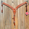 Reinsman Heavy Duty 2" Double Ply Leather Breast Collar with Hand Carved Arizona Flower tooling with spots.  Warm light mahogany color leather.  Stainless steel hardware and tugs and cinch drop.   1" x 12" adjustable tugs. 
