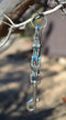 Close Up View Handmade natural horsehair braided key chain with silver tone faux buckle and snap. This key chain is about 6" long including the 1" key ring loop to connect the keys.   Sorrel/Turquoise/Black