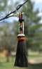 Close Up View 3/8" wide, 3 Strand Braided Horsehair Key Chain. This shorter style is 5 1/2" including the key ring.     White/Orange/Black