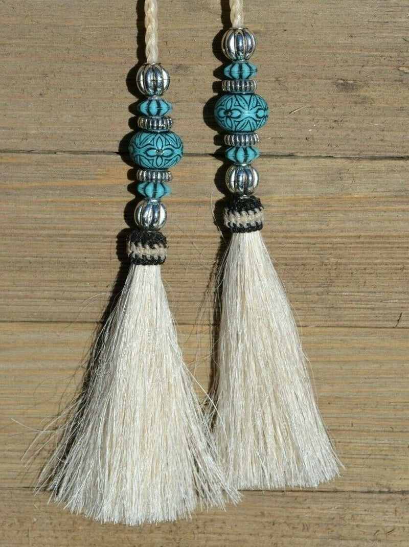 Super Close Up Detail View natural horse hair Stampede String with beads and horse hair tassels and cotter pin attachments. White/Silver/Turquoise