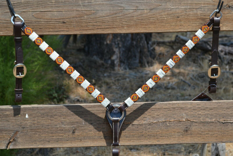 Circle Y of Yoakum - 1" Dark Oil Leather Breast Collar with Infinity Wrap Beading in a bright white, brown, gold and red southwest diamond pattern.  Stainless steel hardware.   12" adjustable tugs.