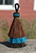 Close Up View 3" 3 bell mule tail cut natural and brightly colored tassels. Handmade from 100% horsehair.    Chestnut/Turquoise/Black