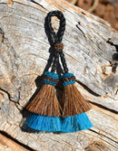 Close Up View 2" Double two Bell mule tail cut natural and brightly colored tassels. Handmade from horsehair dyed in bright colors as well as natural.    Brown/Turquoise
