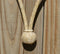 Close Up View Jose Oritz 1/4" hand braided light natural rawhide bosal with round shaped knot.  This bosal has 12 plait cheeks over a flexible all rawhide core.