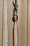 Close Up View Circle Y of Yoakum -  Desert Racer Breast Collar Tie-up Wither Strap.   1 1/2" wither strap had textured cream colored leather with turquoise and antiqued colored spots.   Stainless steel buckles are adjustable on both sides.