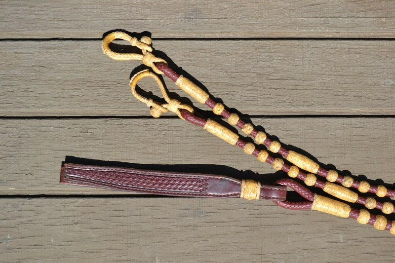 Close Up Beautiful Hand Braided Latigo Leather Romel Reins, 12 plait Hand Braided Natural Rawhide braided in the Oklahoma style with round knots. 