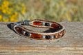 Close Up View Awesome 3/8" wide, 3 Strand Braided Horsehair Bracelet with a lobster claw clasp and various colored and patterned bone beads. White/Chestnut