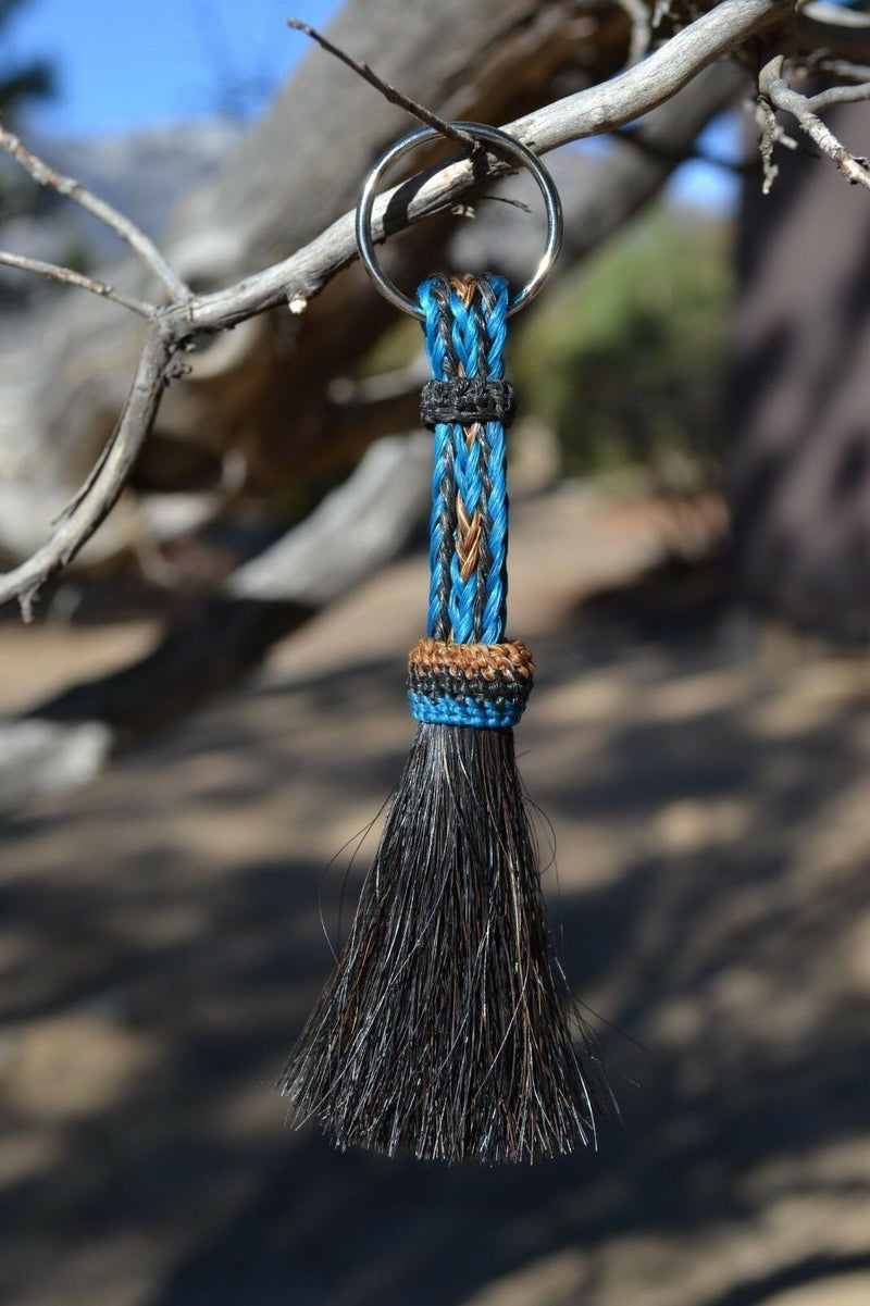 Close Up View 3/8" wide, 3 Strand Braided Horsehair Key Chain. This shorter style is 5 1/2" including the key ring.   Turquoise/Black/Sorrel/Turquoise
