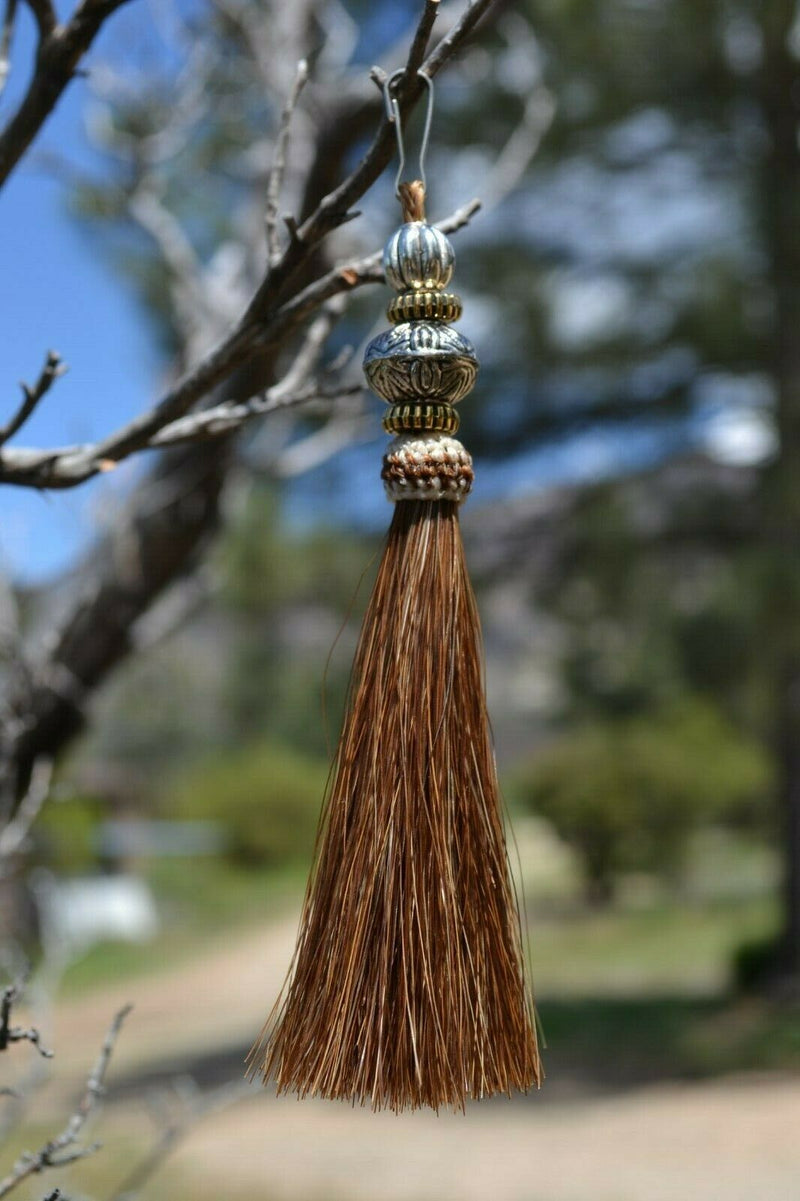 Close Up View 4 1/2" total length horsehair zipper pull with spring clip. Handmade horsehair various colors and beading pattern. Sorrel-Gold/RB/Gold