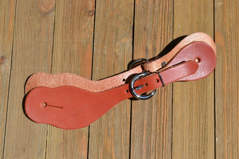 Basic harness leather spur straps with stainless steel buckles.  Nothing fancy, just a plain hard working spur strap.  Sized for Ladies or Youth.