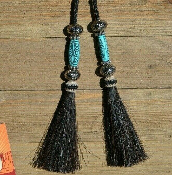 Super Close Up Detail View natural horse hair Stampede String with beads and horse hair tassels and cotter pin attachments. Black-Silver/Turquoise/Silver