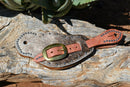 Cowboy Style Hair-On Cowhide Shaped Spur Straps.  Hair-on cowhide with grey & brown brindle coloring with stainless steel spots.  Soft distressed leather lining and Hermann Oak harness leather straps.  Brass buckles.