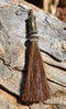 Close Up View 4 1/2" total length horsehair zipper pull with spring clip. Handmade horsehair various colors and beading pattern. Sorrel-Silver/Gold/Silver