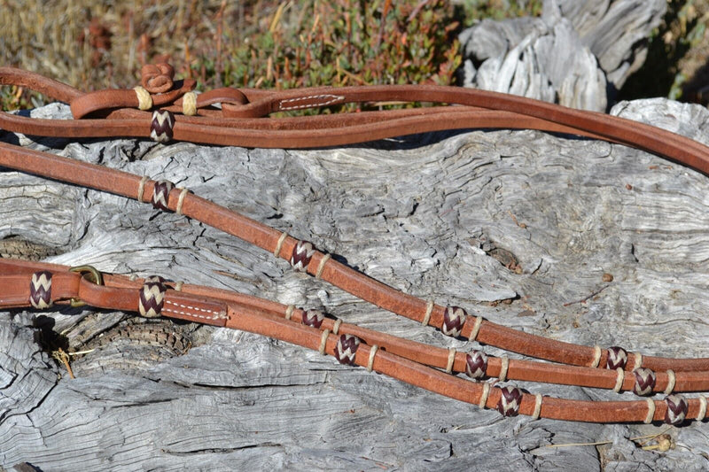 Jose Ortiz 1/2 Flat Harness Romel Reins 4 Braided Rawhide Knots - Natural/Latigo