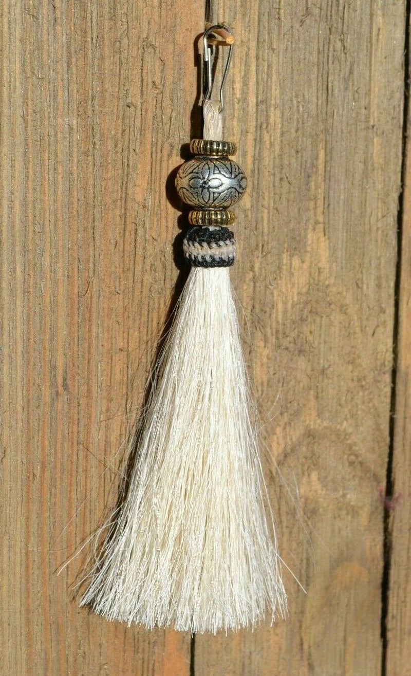 Close Up View 4 1/2" total length horsehair zipper pull with spring clip. Handmade horsehair various colors and beading pattern. White-Gold/RBS/Gold