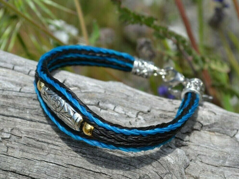 Close Up View Awesome 3/8" wide, 3 Strand Braided Horsehair Bracelet with a lobster claw clasp and various colored beads. Turquoise/Black/Silver