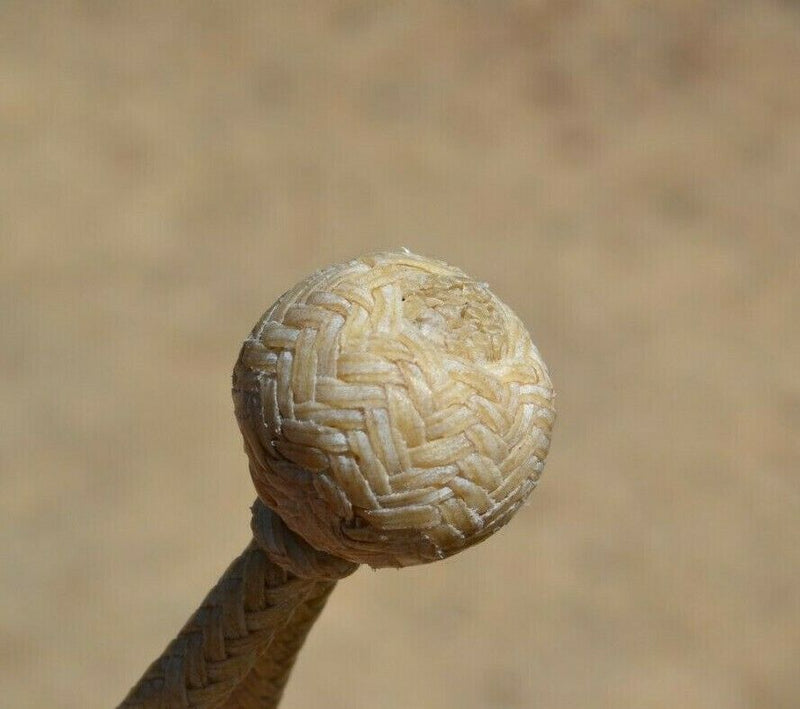 Close UP Rawhide braiding Jose Oritz 1/4" hand braided light natural rawhide bosal with round shaped knot.  This bosal has 12 plait cheeks over a flexible all rawhide core.