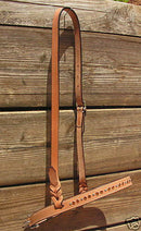 Detailed View Light oil Noseband with orange crystals, alternating stainless steel studs and white stitching.