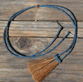 Close Up View natural horse hair stampede string with cotter pin attachments. Sorrel/Turquoise/Sorrel
