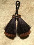 Close Up View 3" Double mule tail cut natural and brightly colored tassels. Handmade from horsehair dyed in bright colors as well as natural.    Black/Brown