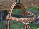Close Up Side View Circle Y of Yoakum - 5/8" Straight Flare Browband Headstall with Rough Out Brow Overlay with buckstitching and Antiqued Copper Spots and Copper Floral Conchos at bit ends. 