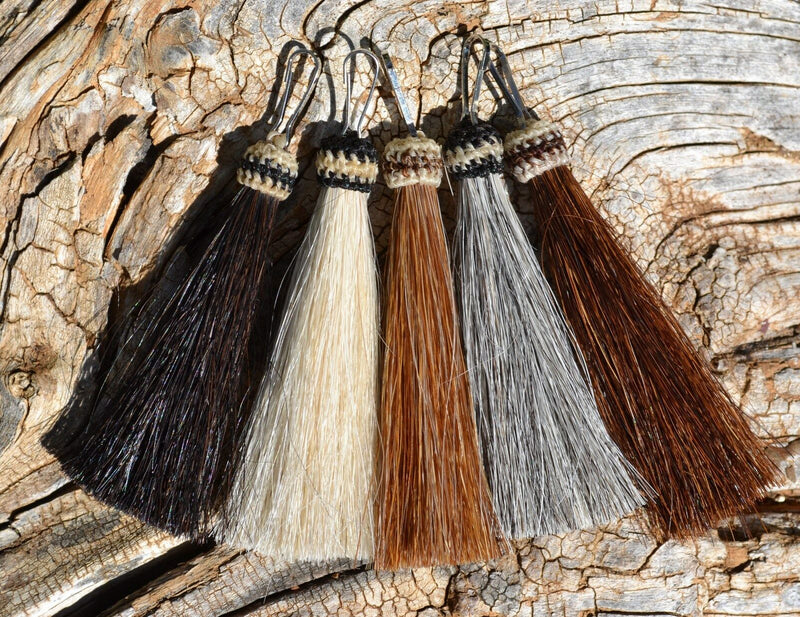 Close Up View Various Colors  3" total length natural horsehair zipper pull with spring clip.  Handmade from 100% natural mane horsehair. 