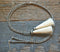 Close Up View natural horse hair stampede string with cotter pin attachments. Black/White/White