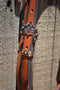 Super Close Up View Right Side View Classic Straight Flared Browband Headstall. Constructed of warm two-ply and stitched medium russet oil bridle leather with basket weave tooling on the flared cowboy cheek pieces. 