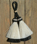 Close Up View 3" Double mule tail cut natural and brightly colored tassels. Handmade from horsehair dyed in bright colors as well as natural.   White/Black
