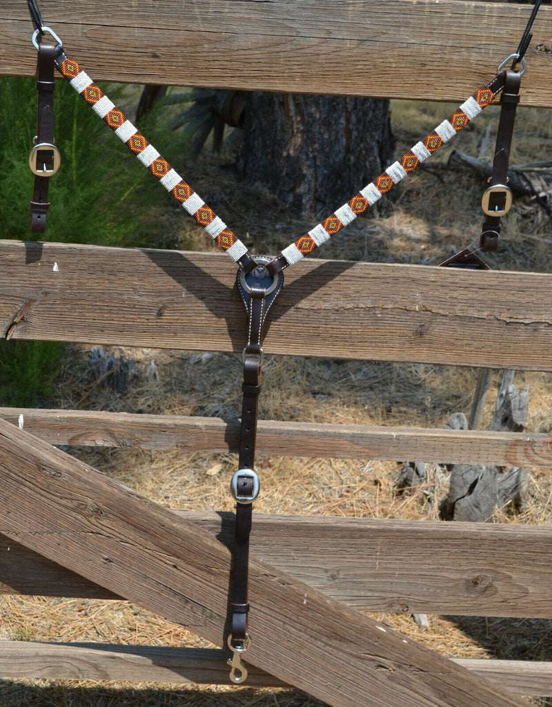 Circle Y of Yoakum - 1" Dark Oil Leather Breast Collar with Infinity Wrap Beading in a bright white, brown, gold and red southwest diamond pattern.  Stainless steel hardware.   12" adjustable tugs.