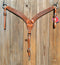 Reinsman Heavy Duty 2" Double Ply Contoured Breast Collar with Hand Carved with Waffle Box Tooling.    Stainless steel hardware and tugs.   1" x 12" adjustable elastic tugs.   Old West antiqued wash color.