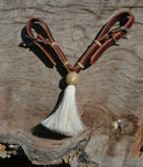 Jose Ortiz handmade 1/2" latigo leather curb strap with tightly braided natural rawhide knot and white mane horsehair tassel.  