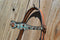 Close Up Browband with Spots Circle Y of Yoakum -  Custom 5/8" Scalloped Browband Gag Headstall  with floral tooling with antiqued wash on crown.   Browband and cheek pieces have turquoise faux gator overlay accented with antiqued parachute spots.   Antiqued copper conchos on browband and bit ends. 