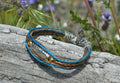 Close Up View Awesome 3/8" wide, 3 Strand Braided Horsehair Bracelet with a lobster claw clasp and various colored beads. Turquoise/Chestnut/Silver