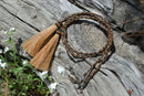 Close Up View Western Style 1/4" wide and 24" long, braided horse hair eye glass holder (gator/leash) with tassels.    Chestnut/Black