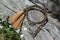 Close Up View Western Style 1/4" wide and 24" long, braided horse hair eye glass holder (gator/leash) with tassels.    Chestnut/Black