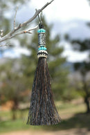 Close Up View 4 1/2" total length horsehair zipper pull with spring clip. Handmade horsehair various colors and beading pattern. Black-Turquoise/Silver/Turquoise