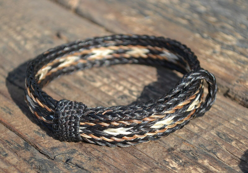 Close Up View Awesome 5/8" wide, 5 Strand Braided Horsehair Bracelet with sliding knot. Black/Sorrel/Black/White