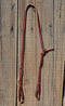 Beautiful single-ply 1/2" latigo self-tie bosal hanger.    Works great as a noseband hanger too.    Traditional style - self-tie with no bulky metal hardware.  Latigo color may vary from light to dark burgundy.  