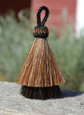 Close Up View 3" two Bell mule tail cut natural and brightly colored tassels. Handmade from horsehair dyed in bright colors as well as natural.   Brown/Black