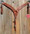 Reinsman Heavy Duty 2" Double Ply Leather Breast Collar with Hand Carved with Snake border tooling.  Warm mahogany color leather.  Stainless steel hardware and tugs and cinch drop.   1" x 12" adjustable tugs. 