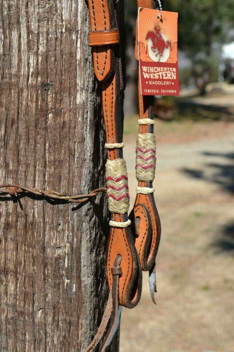 Close Up View Detail 5/8" One Single Ear Headstall with Hand Braided Natural Rawhide with Red Details. 