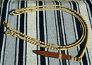 Beautiful Jose Ortiz Romel Reins, 12 plait Hand Braided Light Natural Variegated Rawhide braided in the Oklahoma style with round knots and long buttons