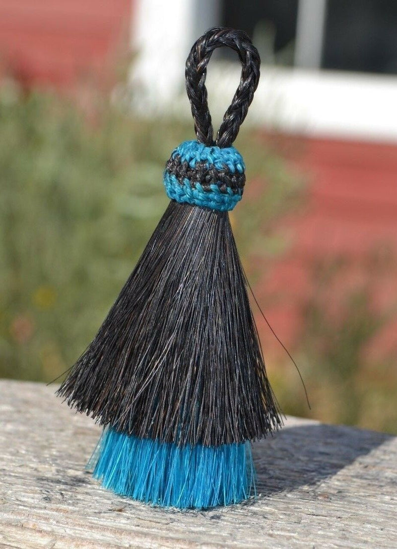 Close Up View 3" two Bell mule tail cut natural and brightly colored tassels. Handmade from horsehair dyed in bright colors as well as natural.     Black /Turquoise
