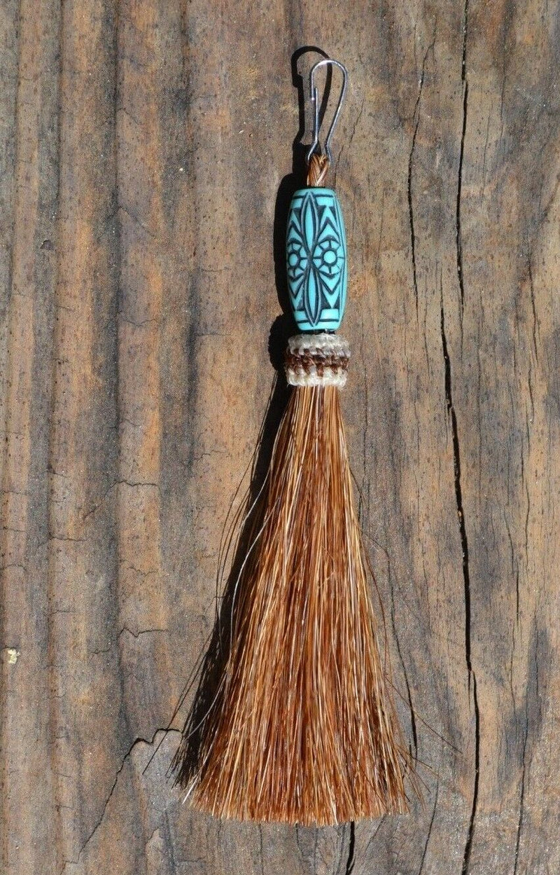 Close Up View 4 1/2" total length horsehair zipper pull with spring clip. Handmade horsehair various colors and beading pattern. Sorrel-Turquoise