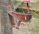 Close Up View Bar H Equine Winged Cross Noseband with White Hair-On Cowhide Leather Inlay and Sunspots Studs.  Stainless steel hardware.